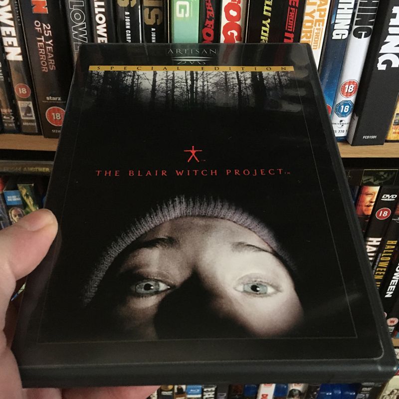 The Blair Witch Project DVD in front of some shelves
