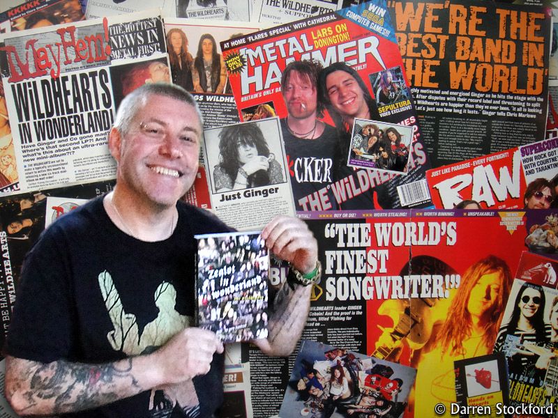 Gary Davidson, author of Zealot In Wonderland, with some Wildhearts press cuttings