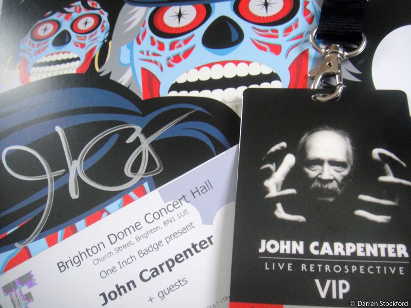 Signed 'They Live' lithograph and VIP laminate for John Carpenter's 2016 tour