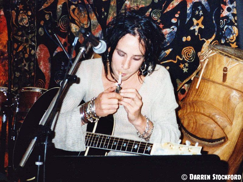 Dregen lights a cigarette at the Kashmir Klub, London, 29 May 1999